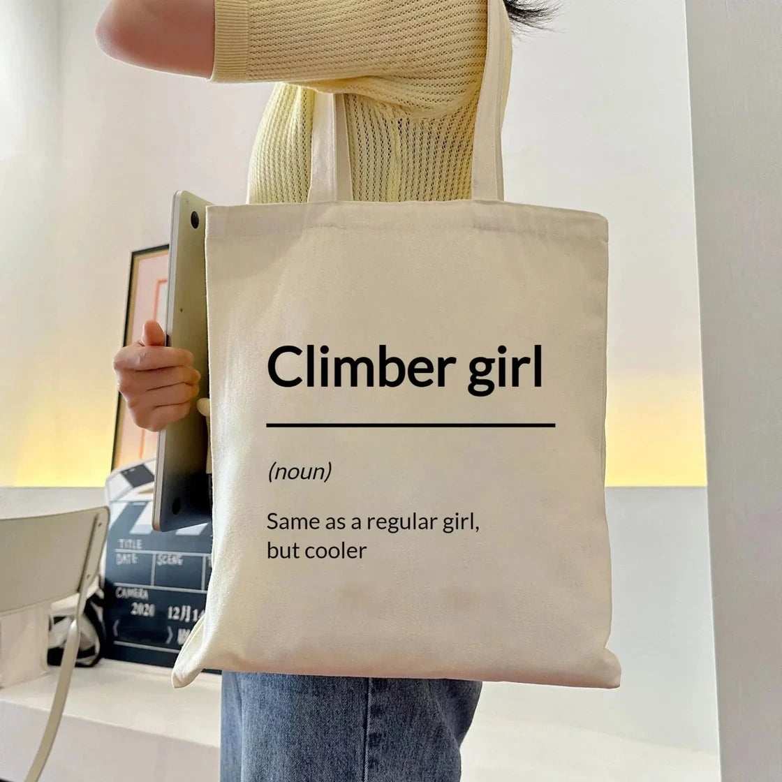 climber girl tote bag in climbing gear shop