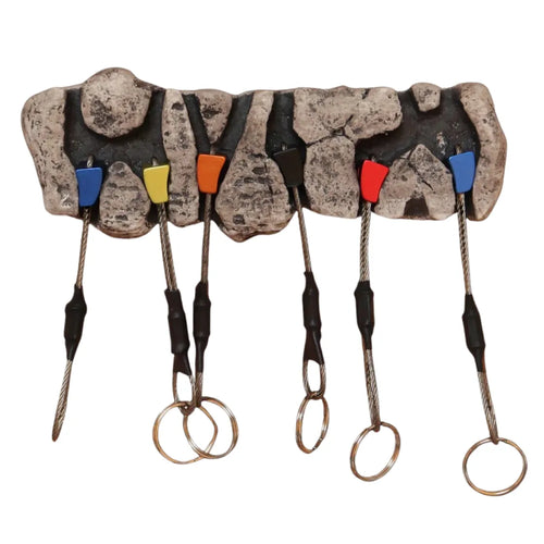 hand holding large rock key holder with attached keys sale