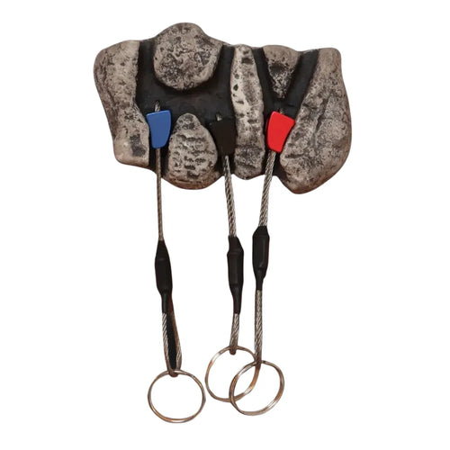 small rock key holder next to potted plant buy now