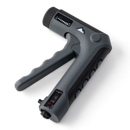 Grey finger trainer shown from an angle with four finger buttons