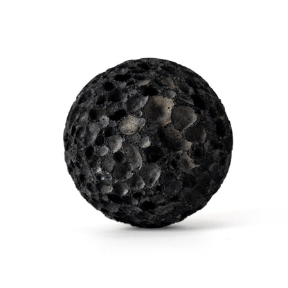 RHINO BALL natural volcanic stone on a white background