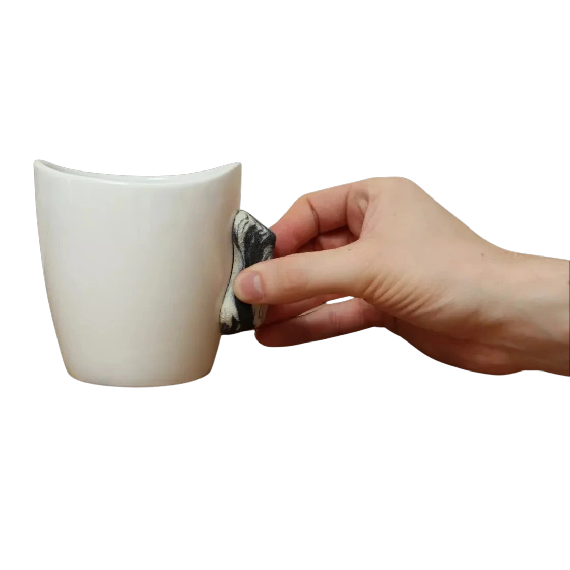 rock climbing mug on table with black handle